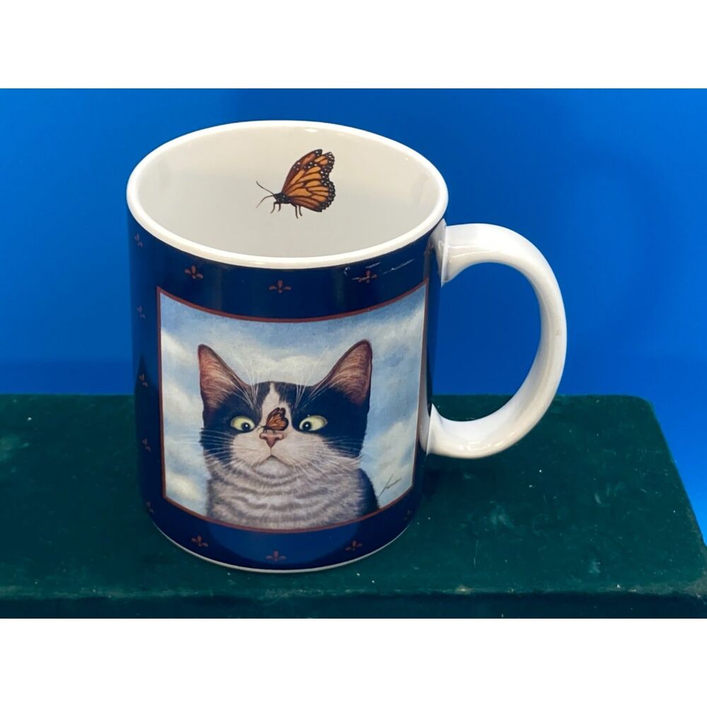 Lang & Wise Cat w butterfly Blue Coffee Mug Hugo Hege Herrero